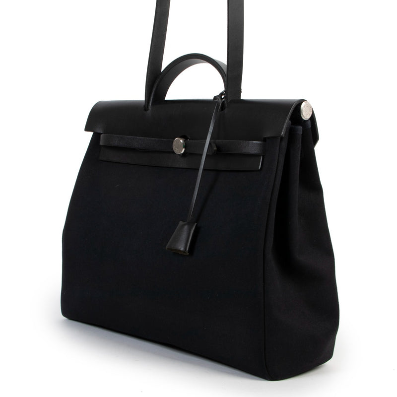 Shop now your pre-loved designer Hermès Top Handle bags at Labellov.
