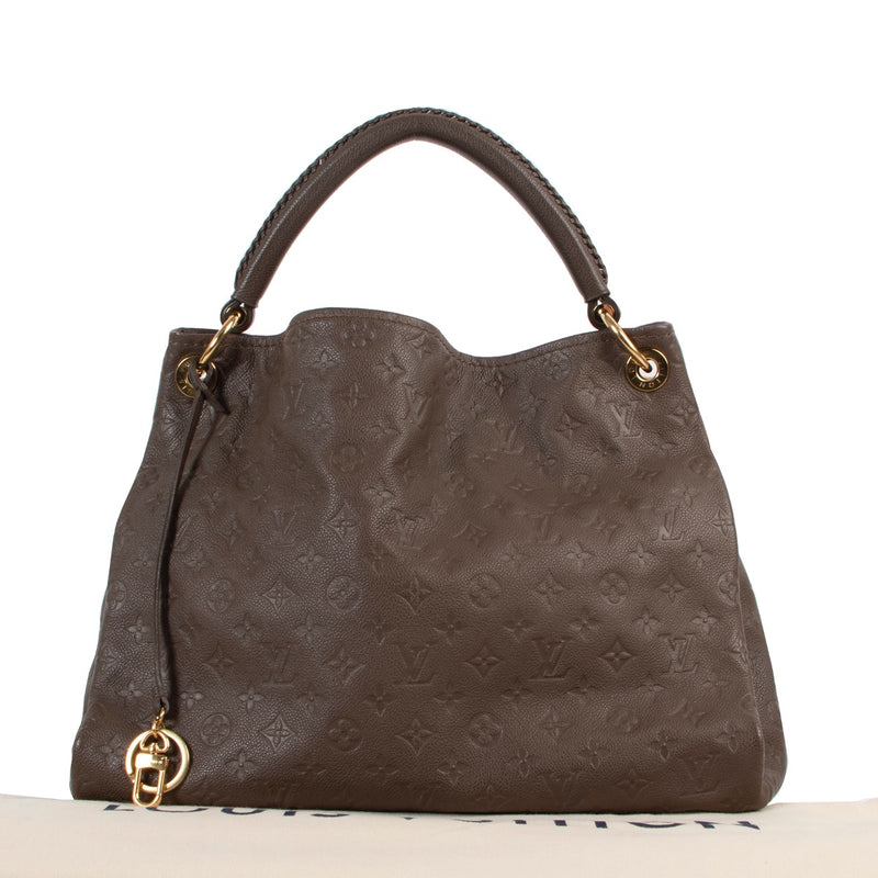 Shop safe online at Labellov in Antwerp this 100% authentic second hand Louis Vuitton Taupe Monogram Empreinte Leather MM Artsy in very good condition.