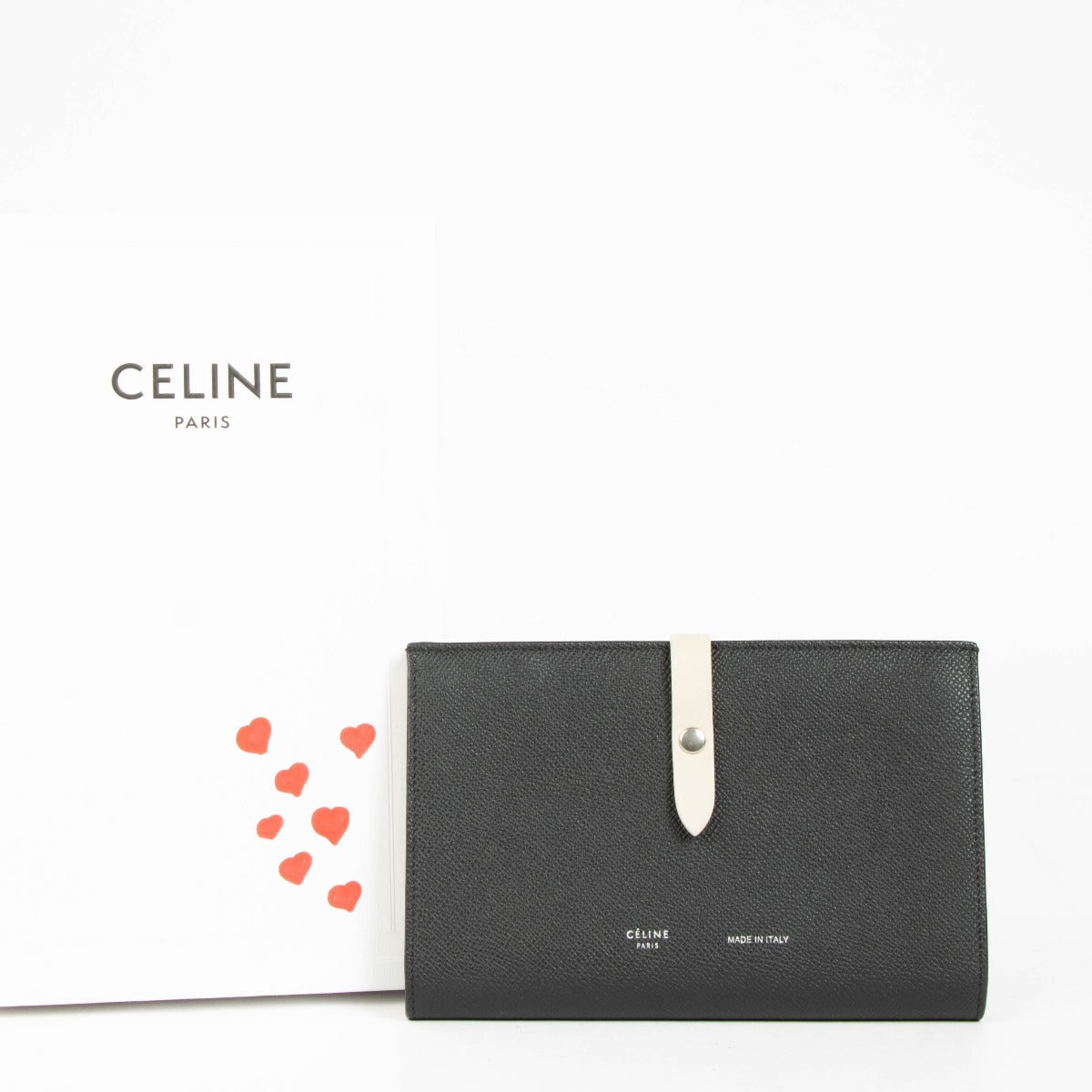Portefeuille Céline à deux volets en cuir noir avec dragonne