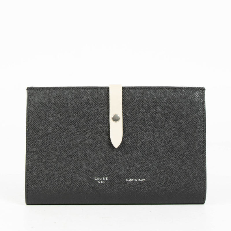 Portefeuille Céline à deux volets en cuir noir avec dragonne