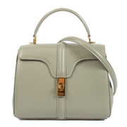 Celine Green Satinated Calfskin Small 16 Bag with gold-tone hardware, top handle, and detachable shoulder strap. Shop now at Labellov.