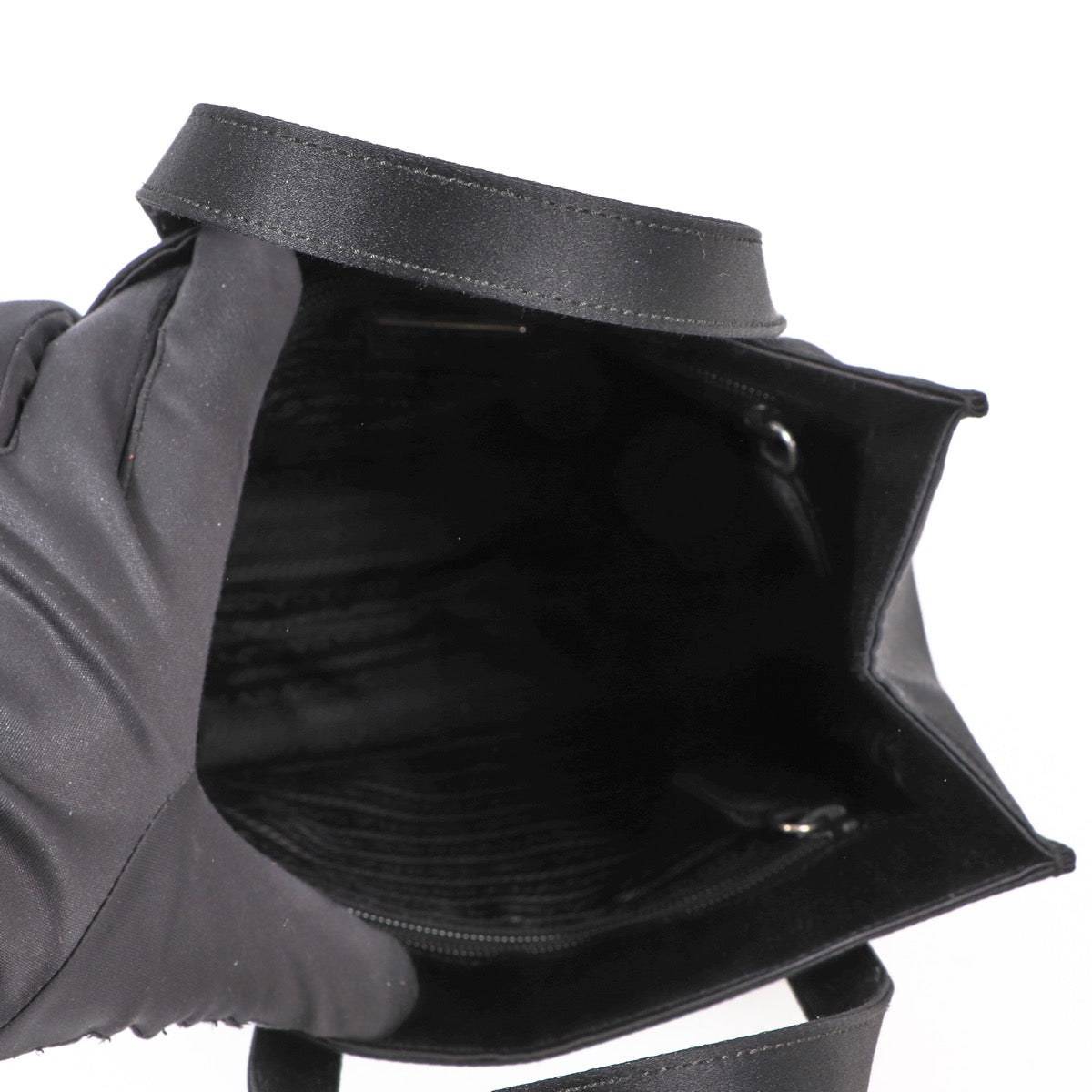 Shop safe online at Labellov in Antwerp, Brussels or Knokke this 100% authentic second hand Prada Black Satin Top Handle