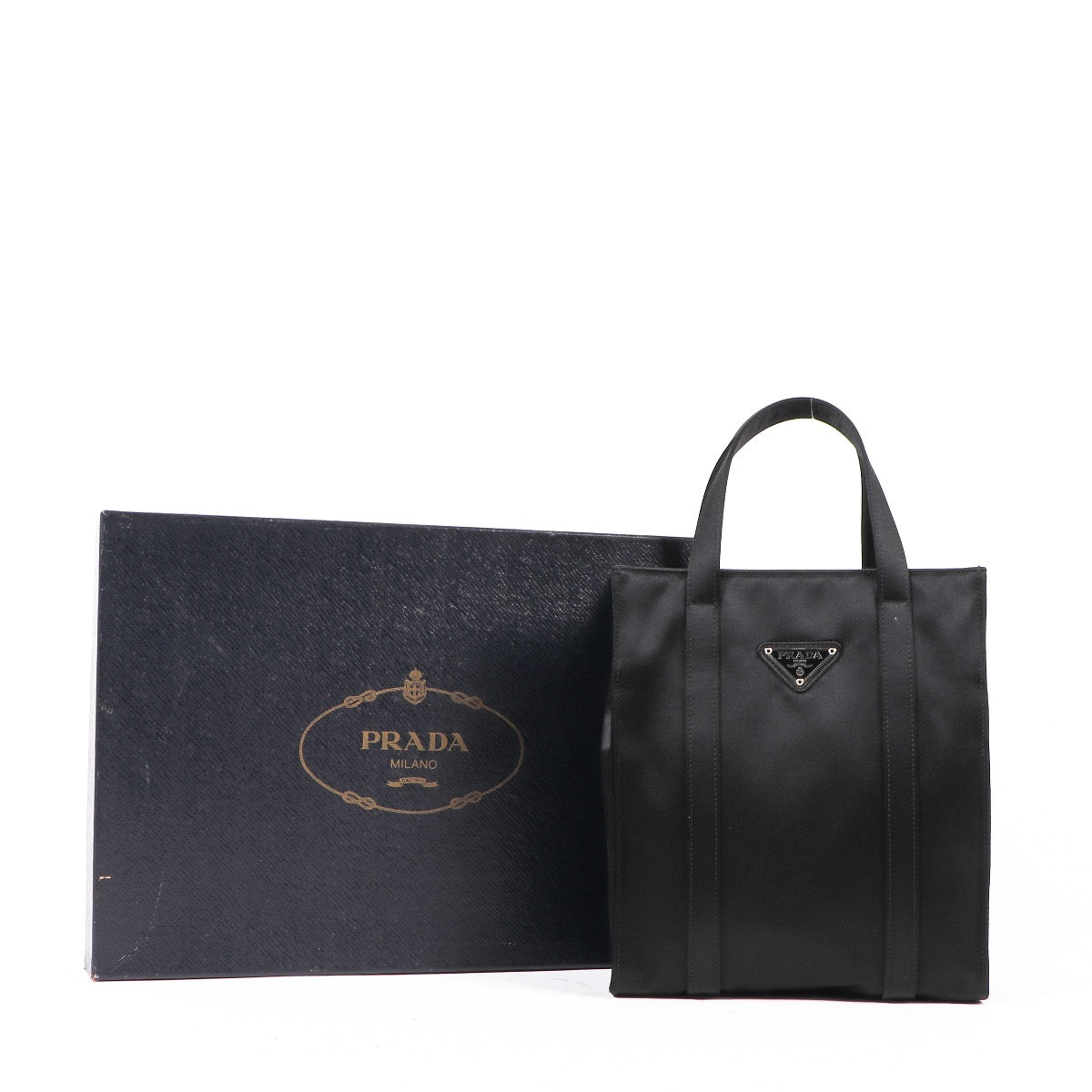 Shop safe online at Labellov in Antwerp, Brussels or Knokke this 100% authentic second hand Prada Black Satin Top Handle