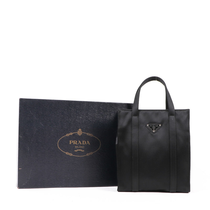 Shop safe online at Labellov in Antwerp, Brussels or Knokke this 100% authentic second hand Prada Black Satin Top Handle