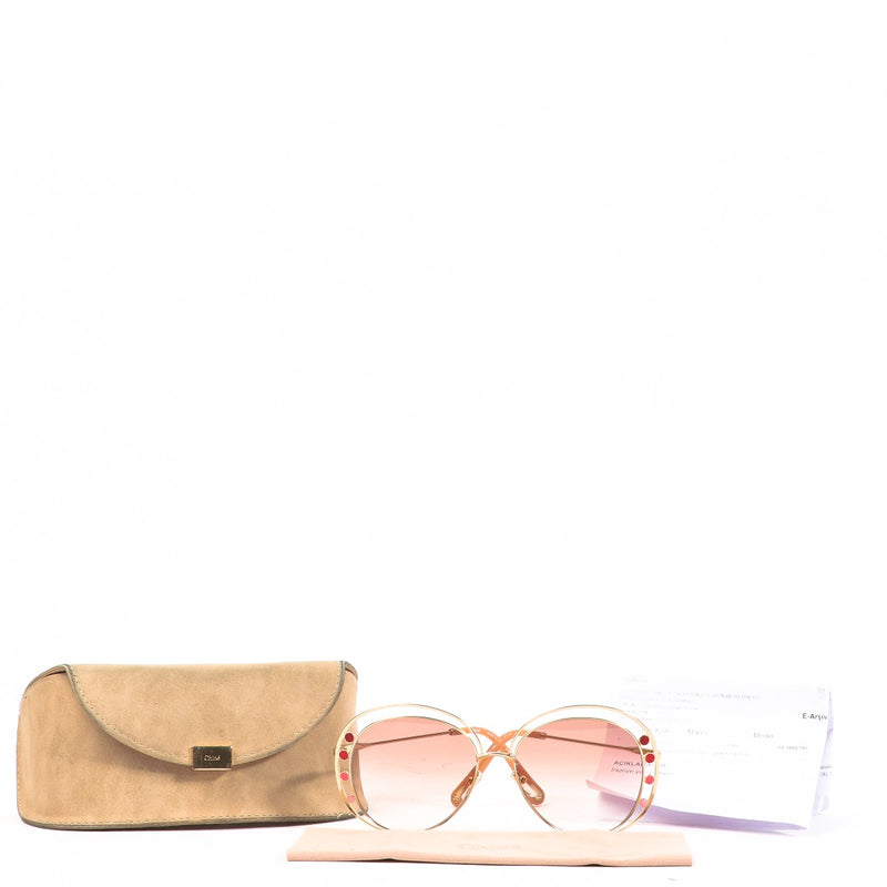 Buy an authentic pair of second hand Chloé Pink Round Sunglasses in very good condition at Labellov.com