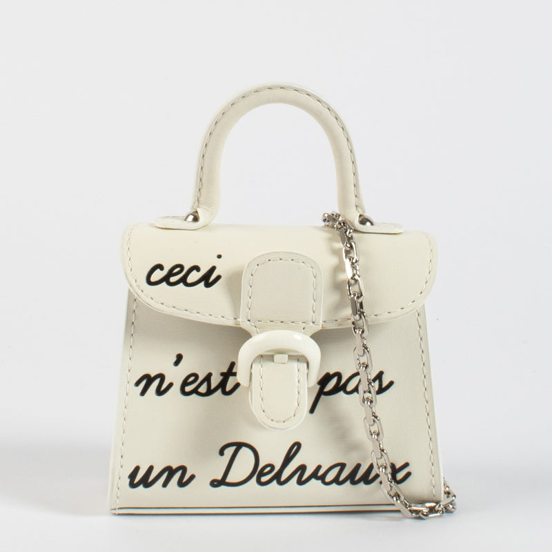 Delvaux Ivoor Miniatuur Brillant L'Humour bedel met ketting