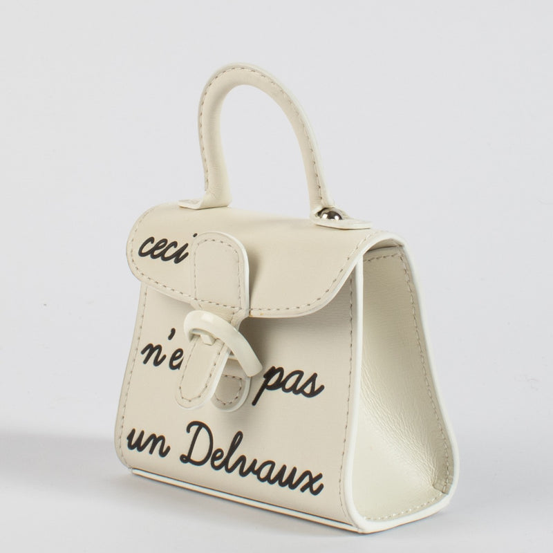 Delvaux Ivoor Miniatuur Brillant L'Humour bedel met ketting