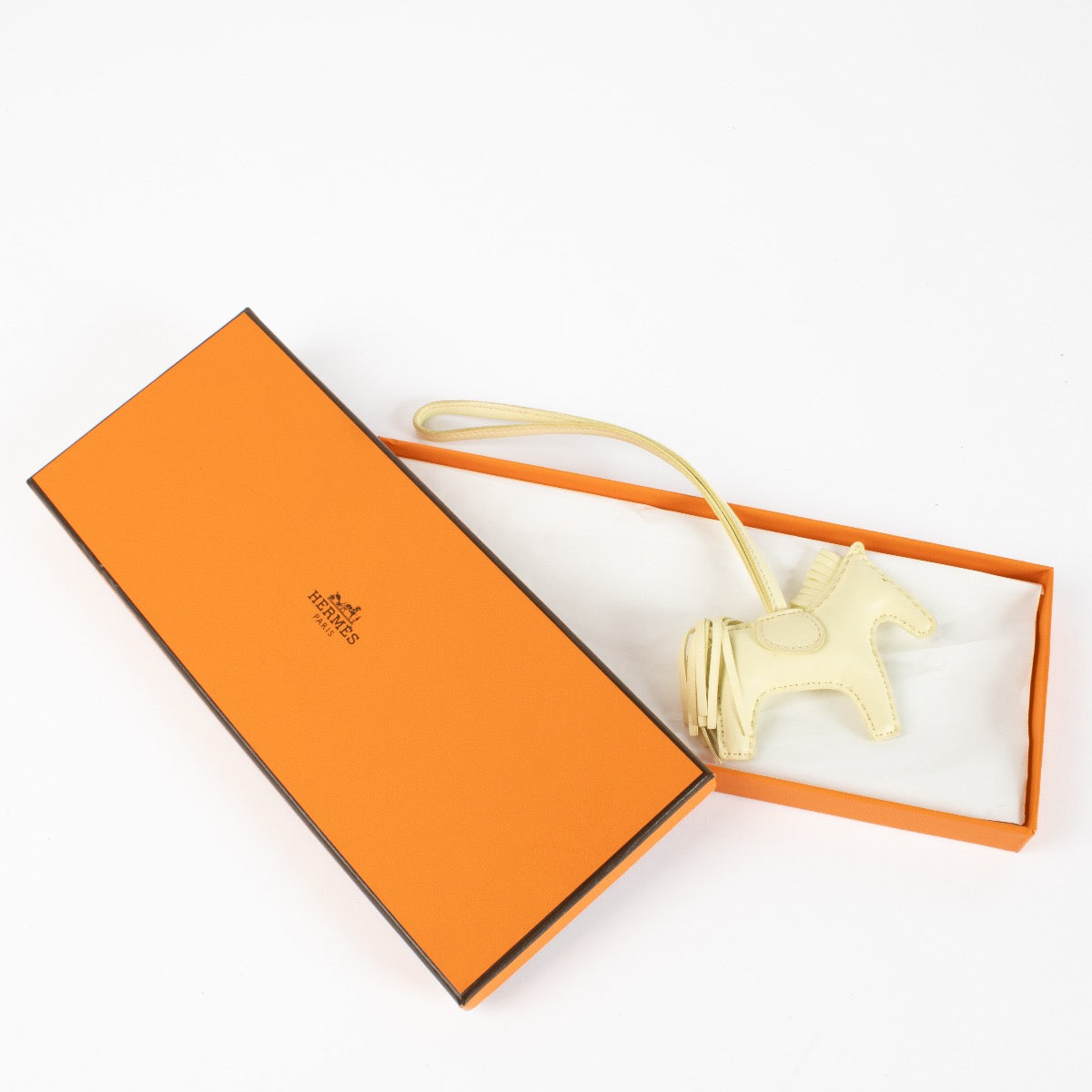Shop 100% authentic second hand Hermès Yellow Rodeo PM Charm on Labellov.com