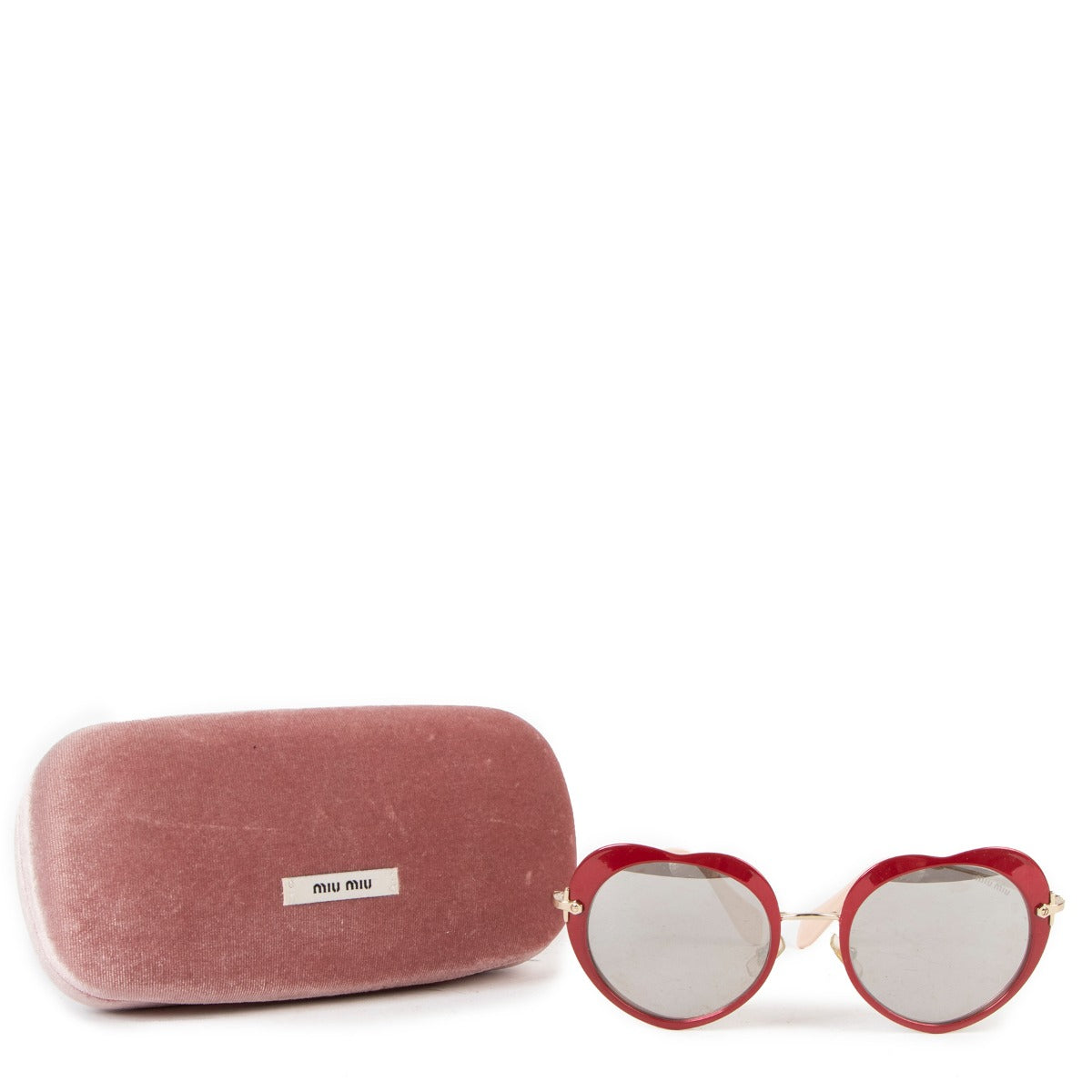 Buy authentic second hand Miu Miu Abstract Heart Sunglasses in very good condition at Labellov in Antwerp.