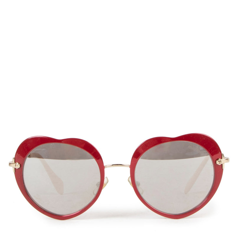 Buy authentic second hand Miu Miu Abstract Heart Sunglasses in very good condition at Labellov in Antwerp.