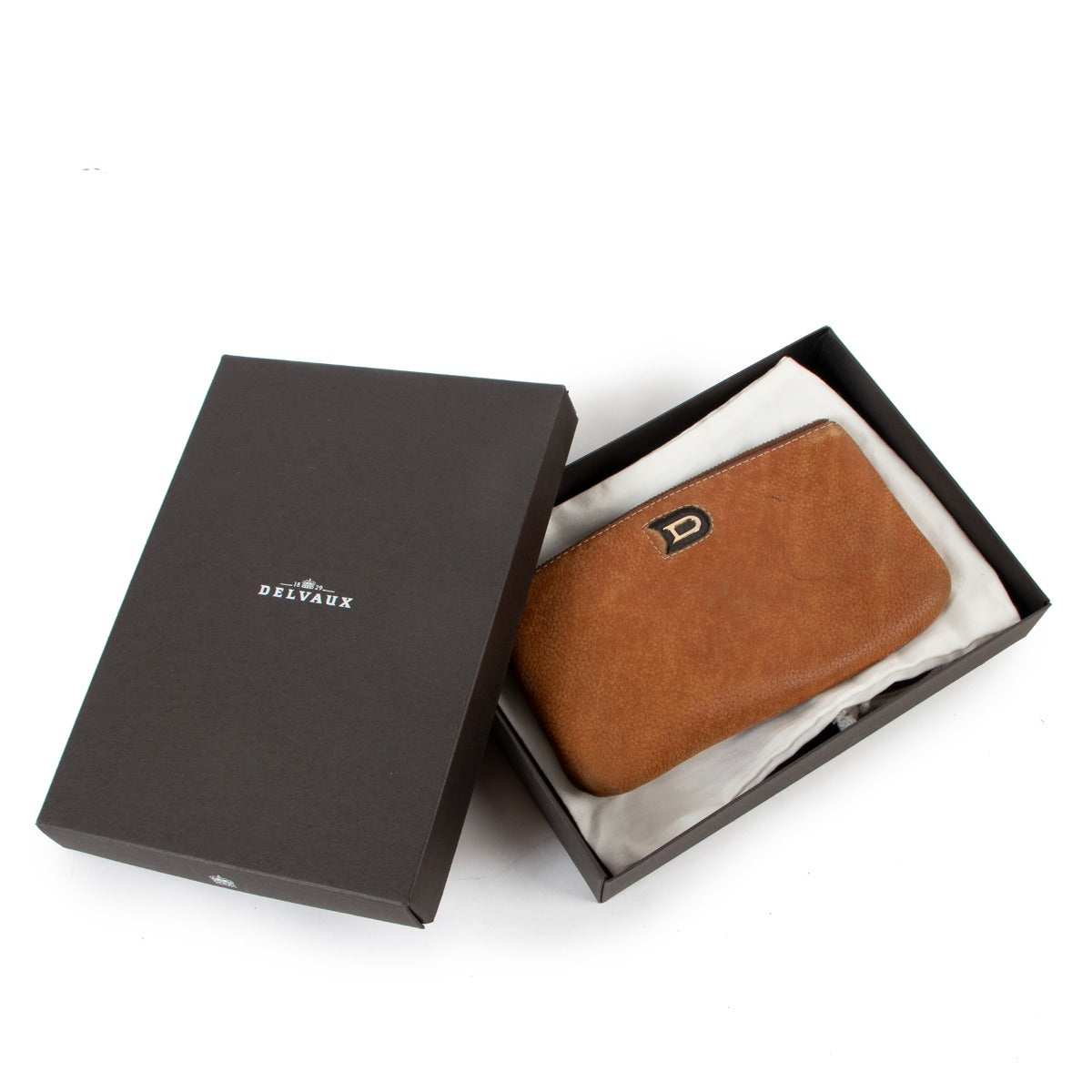 Shop safe online at Labellov in Antwerp this 100% authentic second hand Delvaux Cognac Leather Pouch
