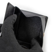 Shop authentic second hand designer fashion Louis Vuitton Vintage Black Epi Leather Coin Purse at Labellov.