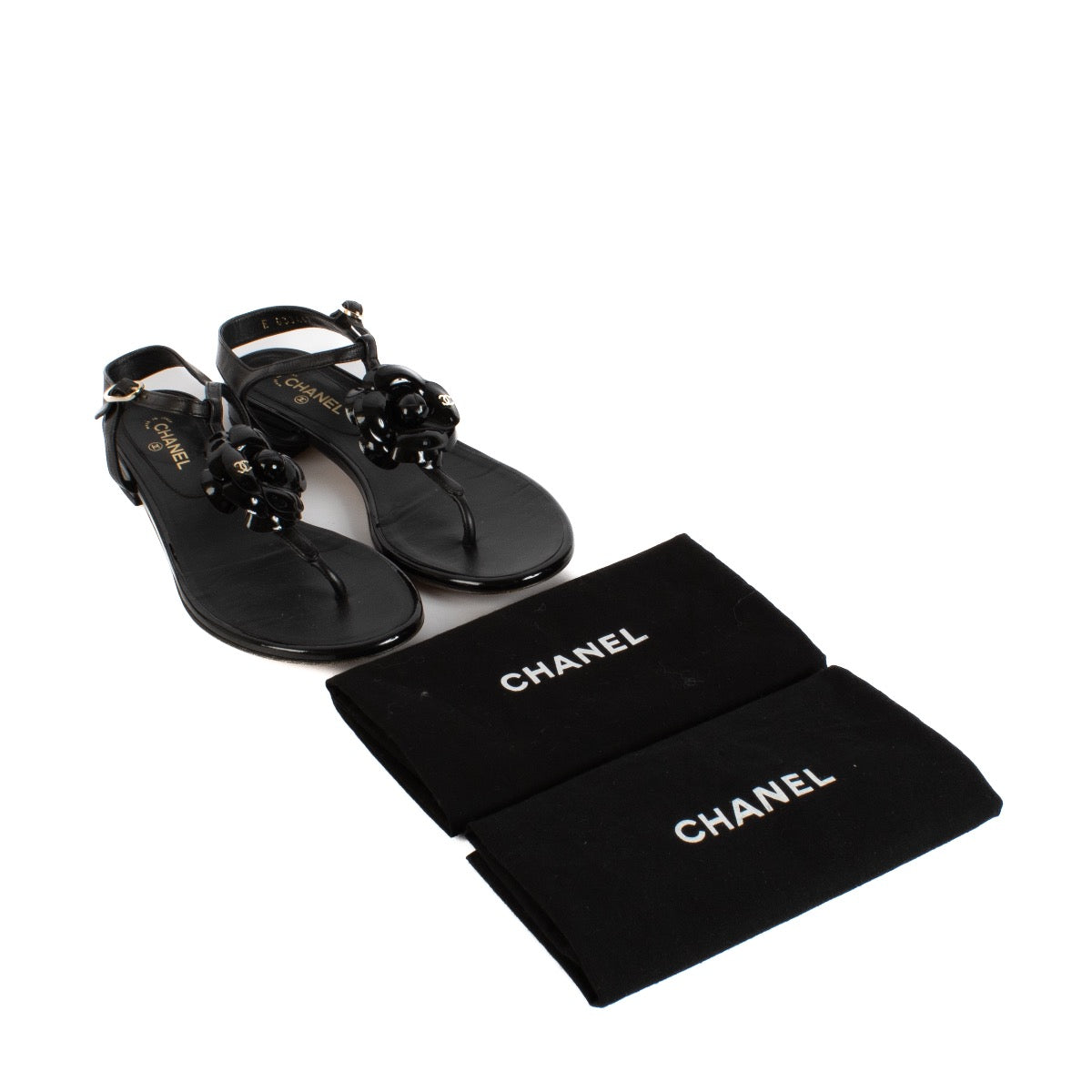 Shop safe online at Labellov in Antwerp, Brussels and Knokke this 100% authentic second hand Chanel Black Camellia Sandals - size 37