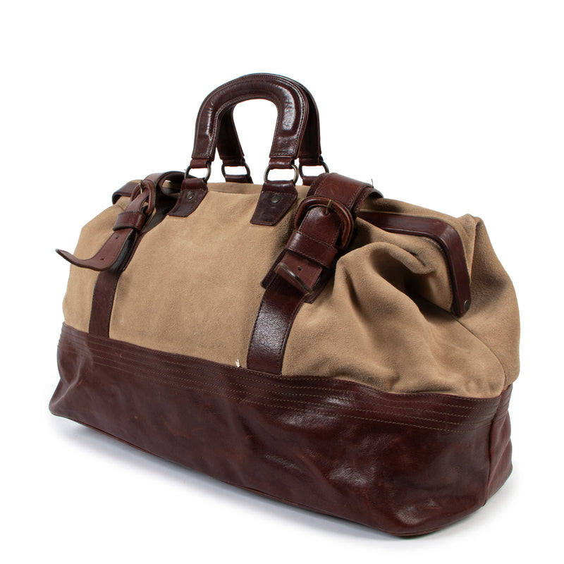 Are you looking for an authentic designer Dries Van Noten Beige Suede Leather Duffle Bag?