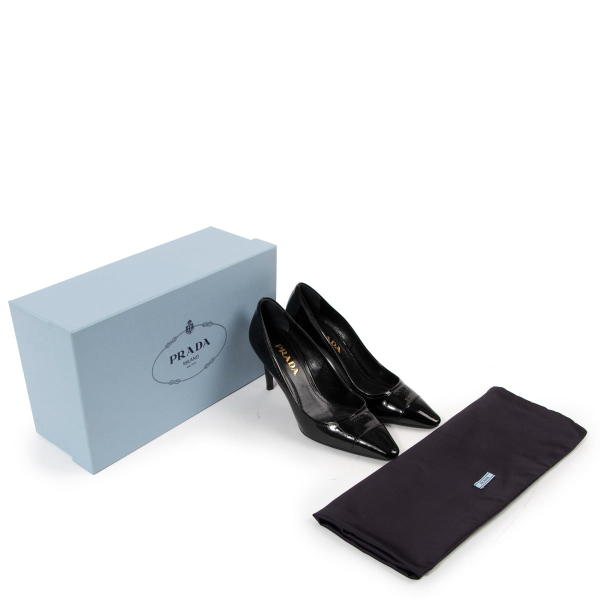 Buy authentic second-hand Prada Black Patent Leather Heels in very good condition at Labellov Antwerp.