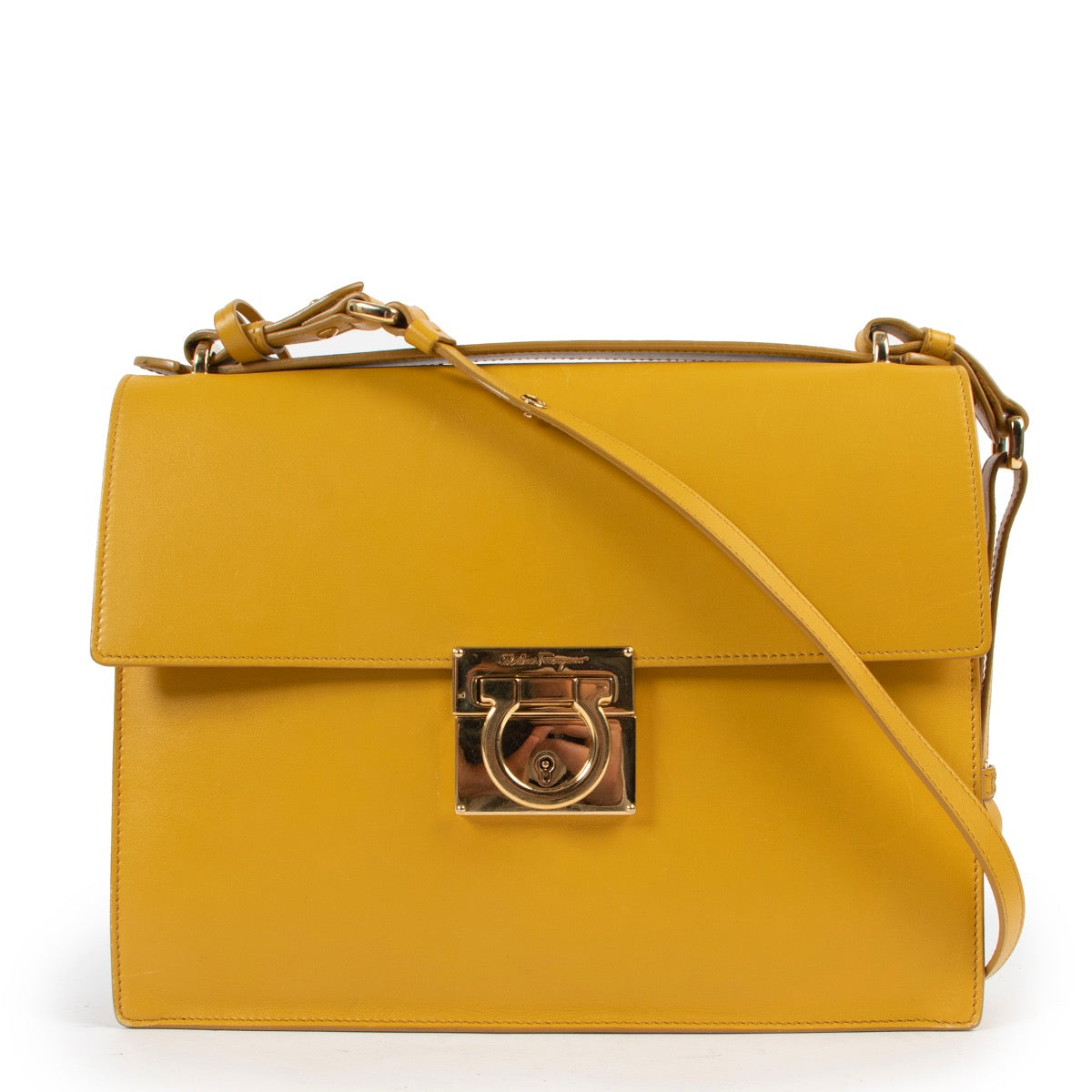Shop safe online at Labellov in Antwerp this 100% authentic second hand Salvatore Ferragamo Mustard Crossbody