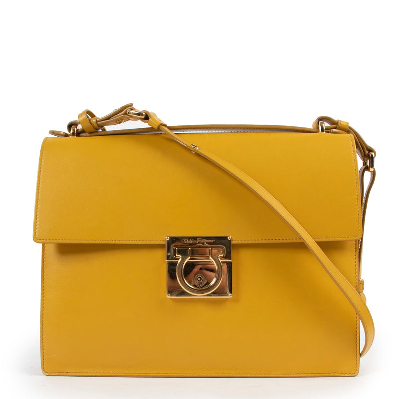 Shop safe online at Labellov in Antwerp this 100% authentic second hand Salvatore Ferragamo Mustard Crossbody