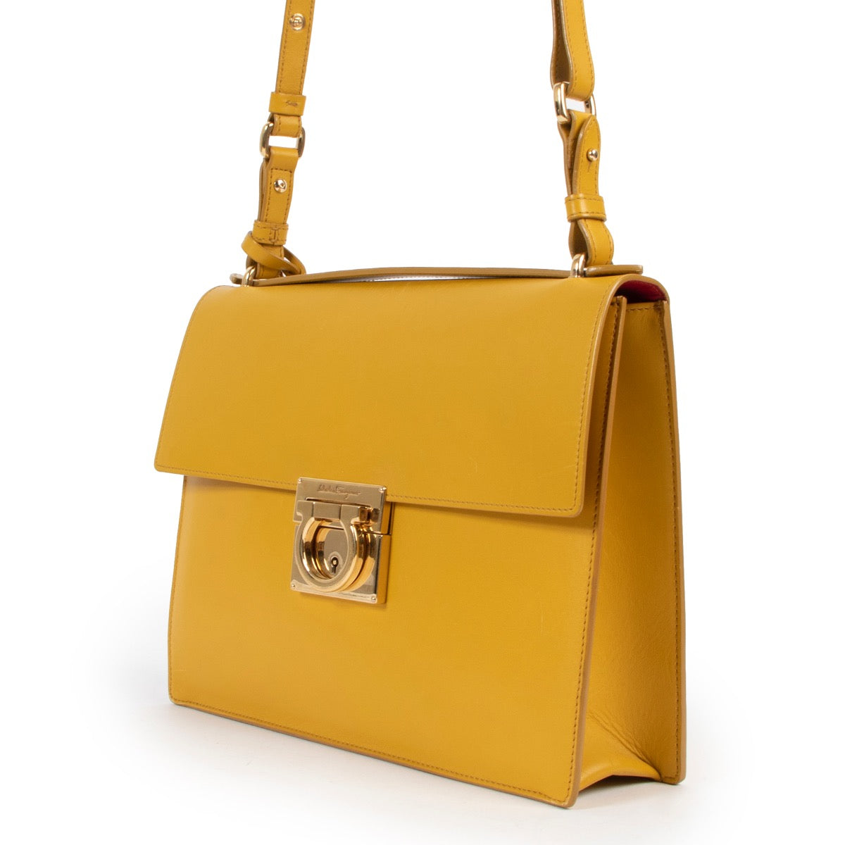 Shop safe online at Labellov in Antwerp this 100% authentic second hand Salvatore Ferragamo Mustard Crossbody