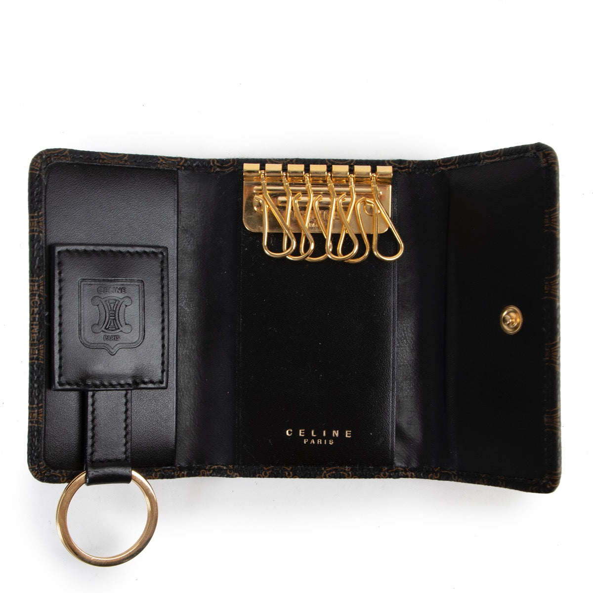 Buy an authentic second hand Celine Macadam Leather Key Wallet as new at Labellov