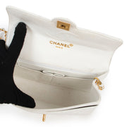 Buy an authentic second hand Chanel White Mini Classic Flap Bag in good condition at Labellov