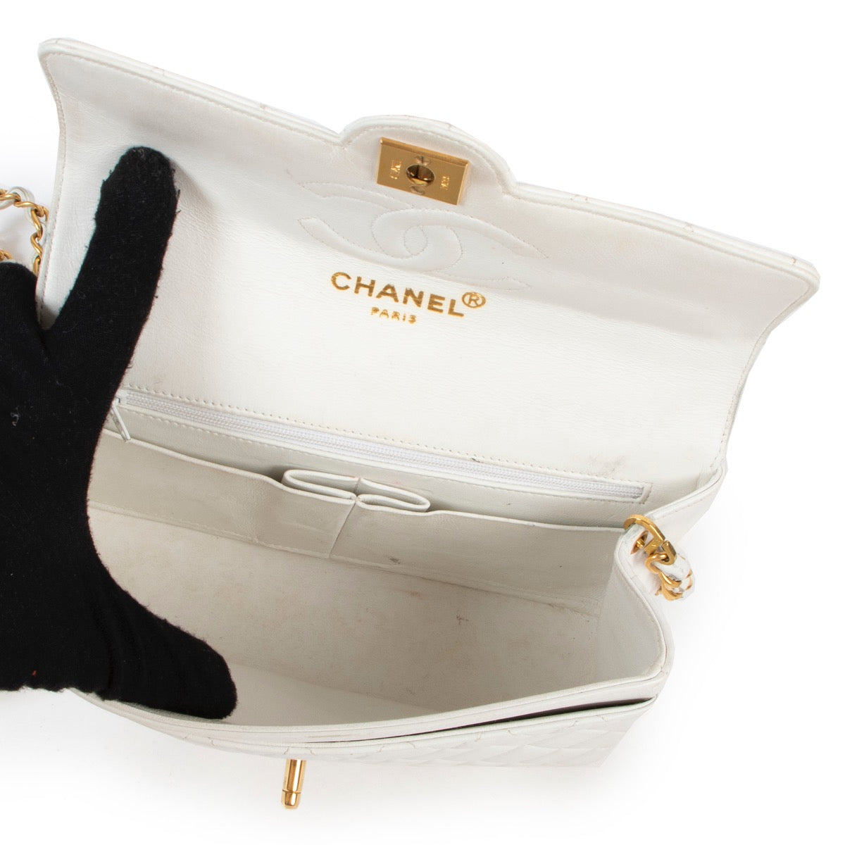 Buy an authentic second hand Chanel White Mini Classic Flap Bag in good condition at Labellov
