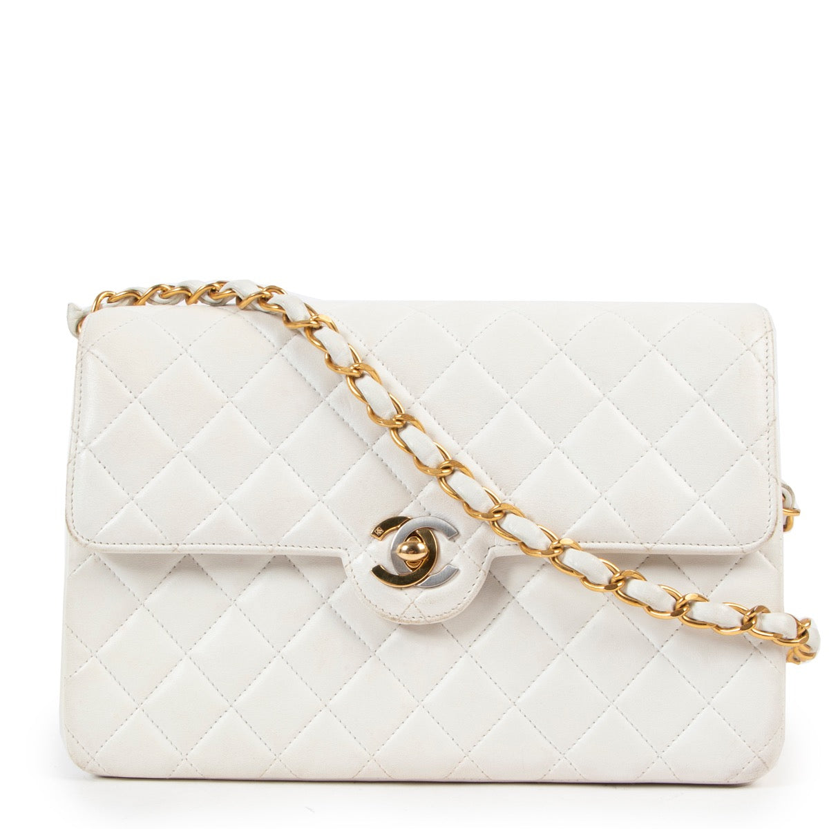 Buy an authentic second hand Chanel White Mini Classic Flap Bag in good condition at Labellov