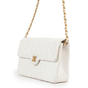 Buy an authentic second hand Chanel White Mini Classic Flap Bag in good condition at Labellov