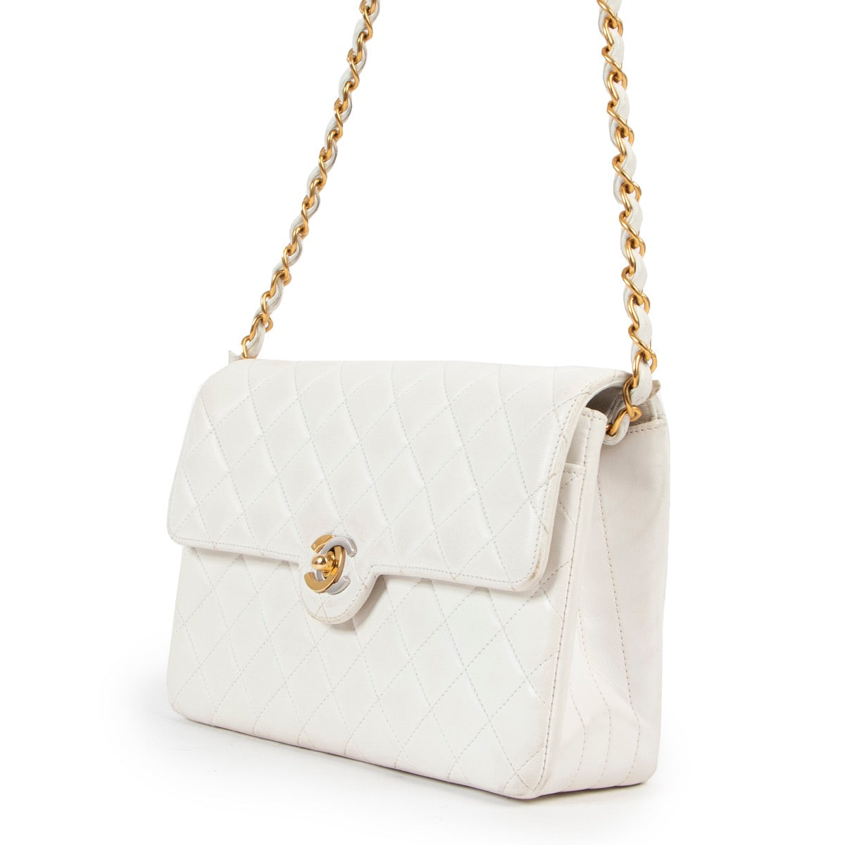 Buy an authentic second hand Chanel White Mini Classic Flap Bag in good condition at Labellov
