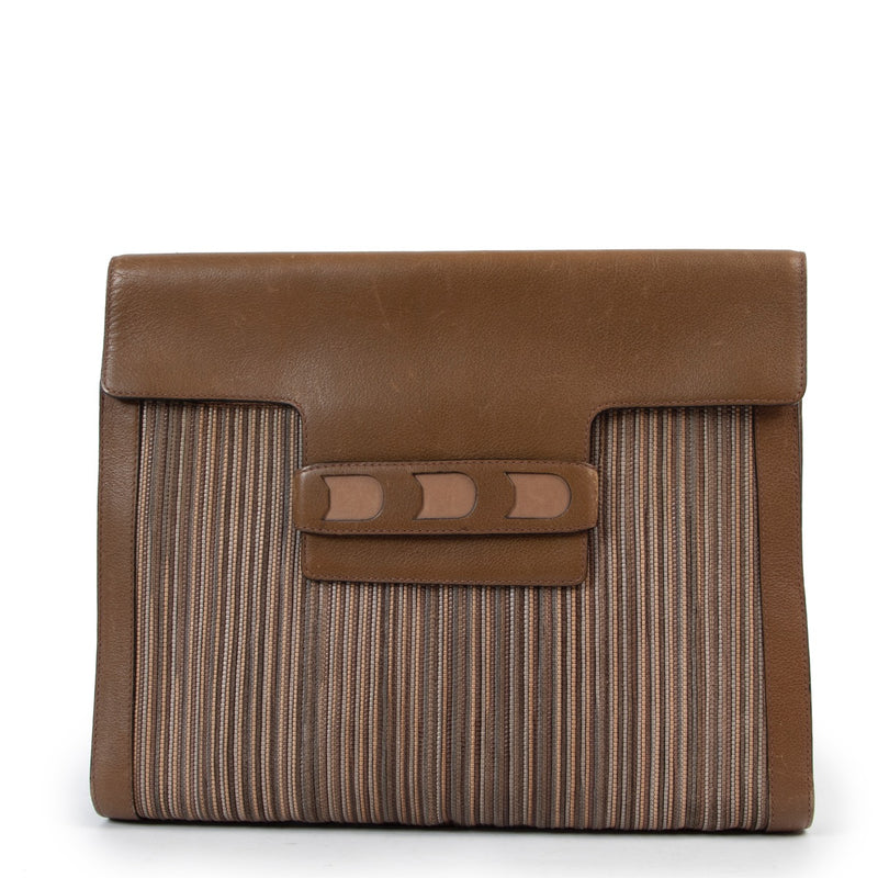 Buy an authentic second hand Delvaux Brown Toile De Cuir Clutch at Labellov