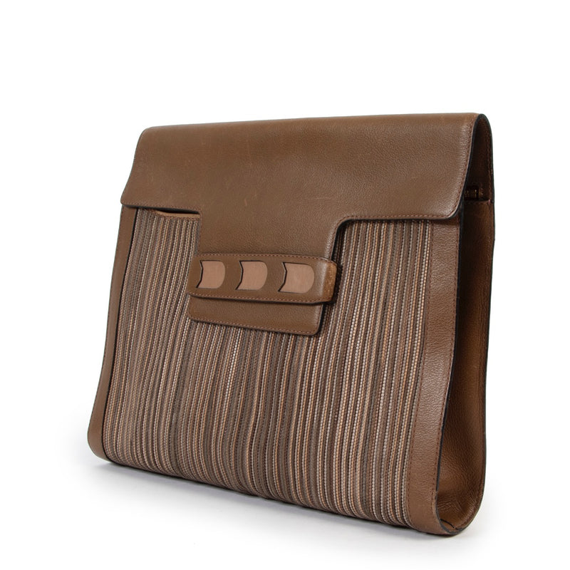 Buy an authentic second hand Delvaux Brown Toile De Cuir Clutch at Labellov