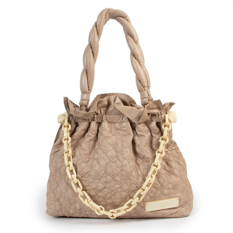 Shop authentic second hand vintage Louis Vuitton Ecru Monogram Olympe Stratus GM Shoulder Bag at Labellov