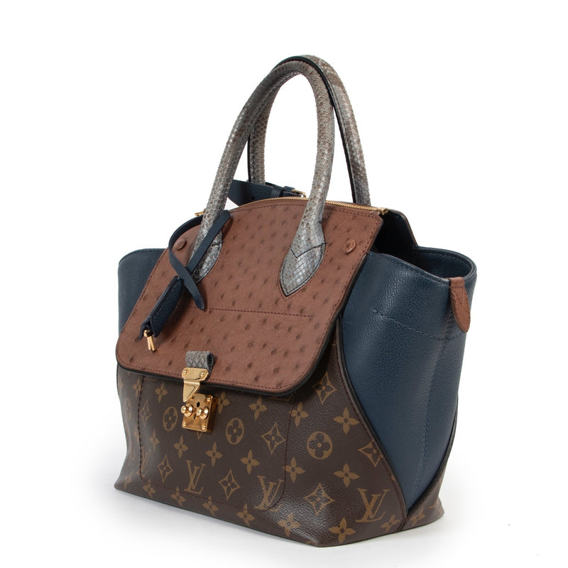Buy an authentic second hand Louis Vuitton Majestueux Blue Python Ostrich Monogram Top Handle in very good condition at Labellov.