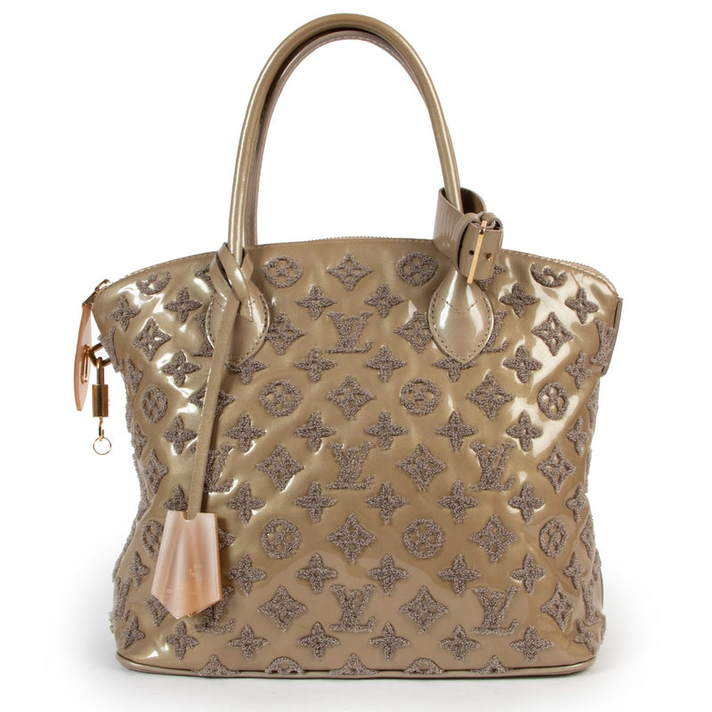Shop authentic second hand designer vintage Louis Vuitton Limited Edition Beige Monogram Fascination Lockit Bag at Labellov