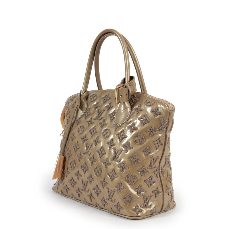 Shop authentic second hand designer vintage Louis Vuitton Limited Edition Beige Monogram Fascination Lockit Bag at Labellov