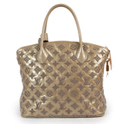 Shop authentic second hand designer vintage Louis Vuitton Limited Edition Beige Monogram Fascination Lockit Bag at Labellov