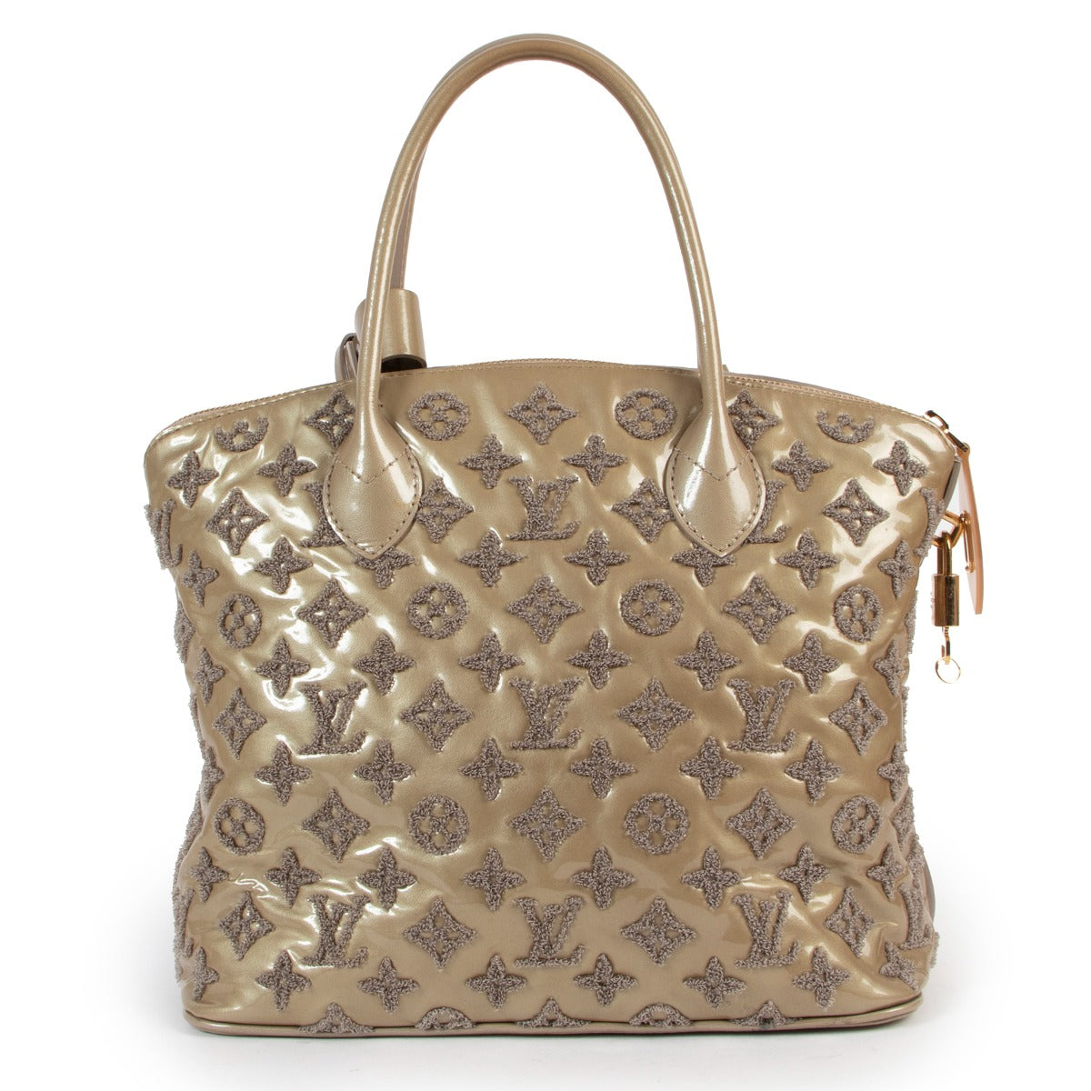 Shop authentic second hand designer vintage Louis Vuitton Limited Edition Beige Monogram Fascination Lockit Bag at Labellov