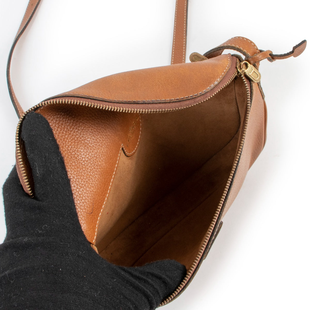 Buy an authentic second hand Delvaux Macao Cognac Leather Crossbody in pre-loved condition at Labellov
