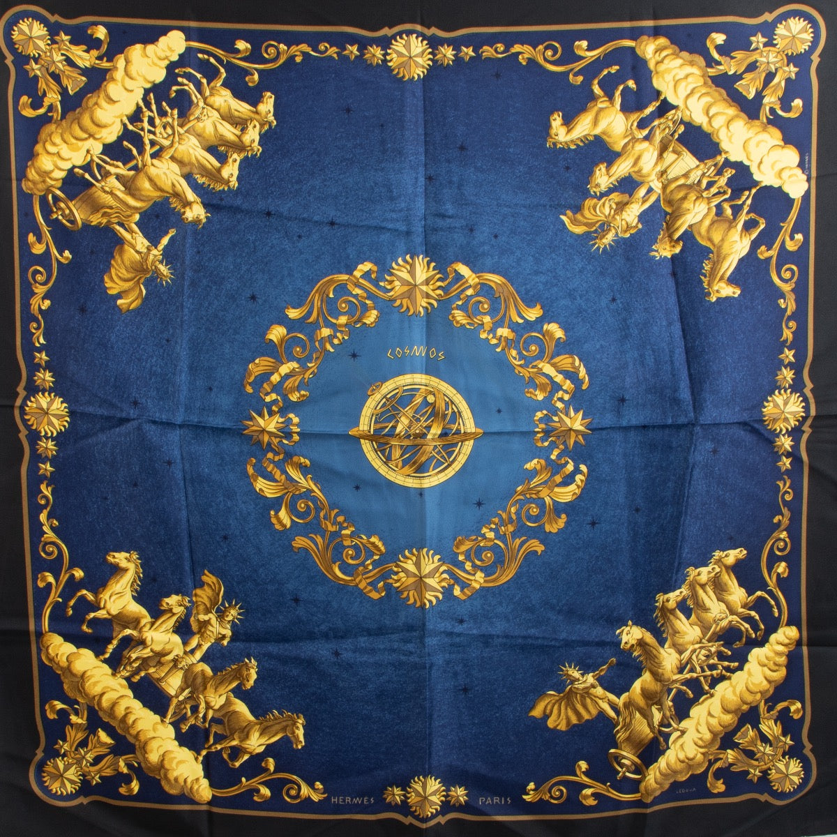 Shop safe online at Labellov in Antwerp, Brussels and Knokke this 100% authentic second hand Hermès Blue Cosmos Silk Scarf