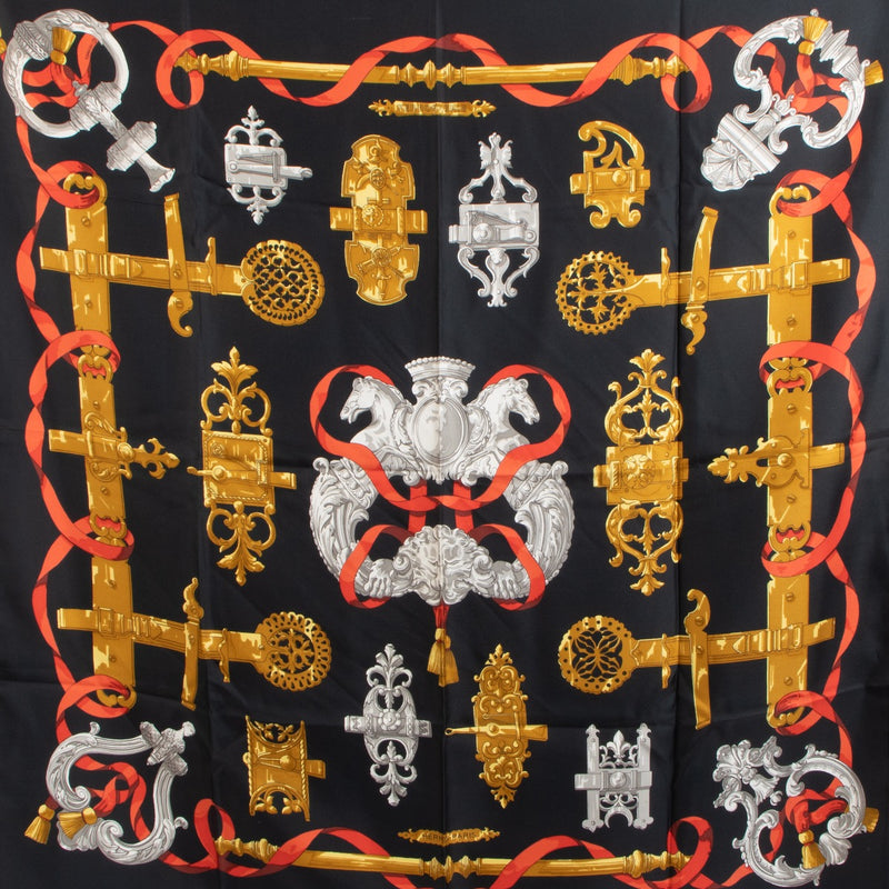 Shop safe online at Labellov in Antwerp, Brussels and Knokke this 100% authentic second hand Hermès Black 'Ferronnerie' Carré 90 Silk Scarf