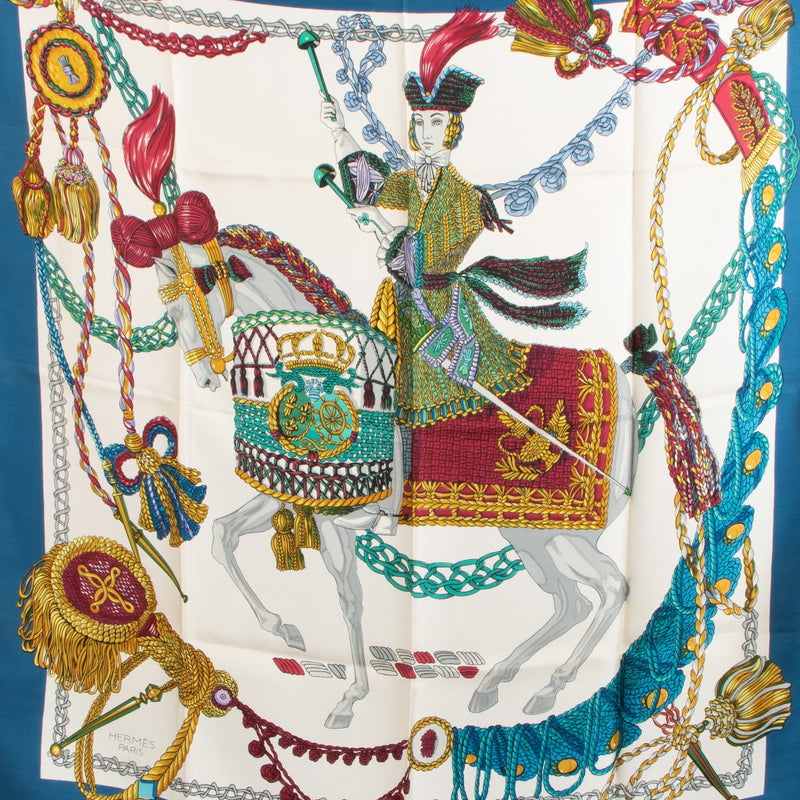 Shop safe online at Labellov in Antwerp, Brussels and Knokke this 100% authentic second hand Hermès Blue 'La Timbalier' Carré 90 Silk Scarf