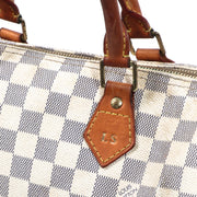 Buy an authentic second-hand Louis Vuitton Damier Azur Canvas Speedy 30 Top Handle Bag in very good condition at Labellov in Antwerp.