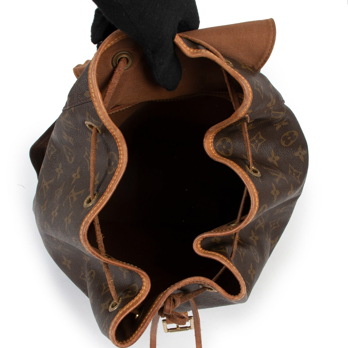 Shop authentic second hand vintage Louis Vuitton Montsouris GM Monogram Canvas Backpack at Labellov