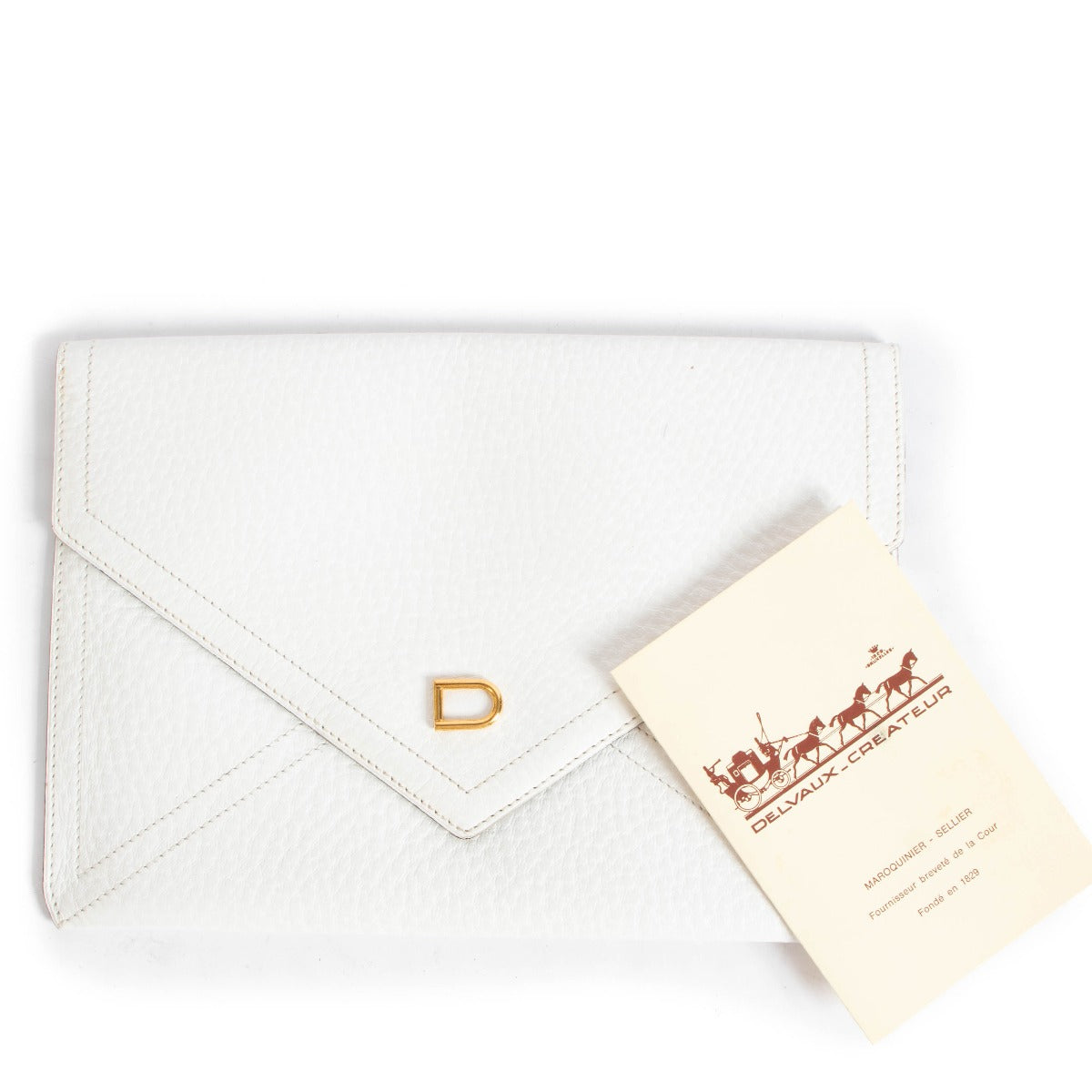 Shop a 100% authentic Delvaux White Leather Barrette Clutch on Labellov.com.