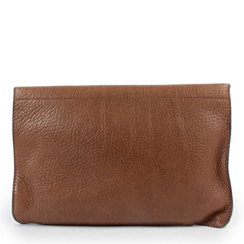 Buy online an authentic second hand Delvaux clutch in preloved condition at Labellov in Antwerp.
