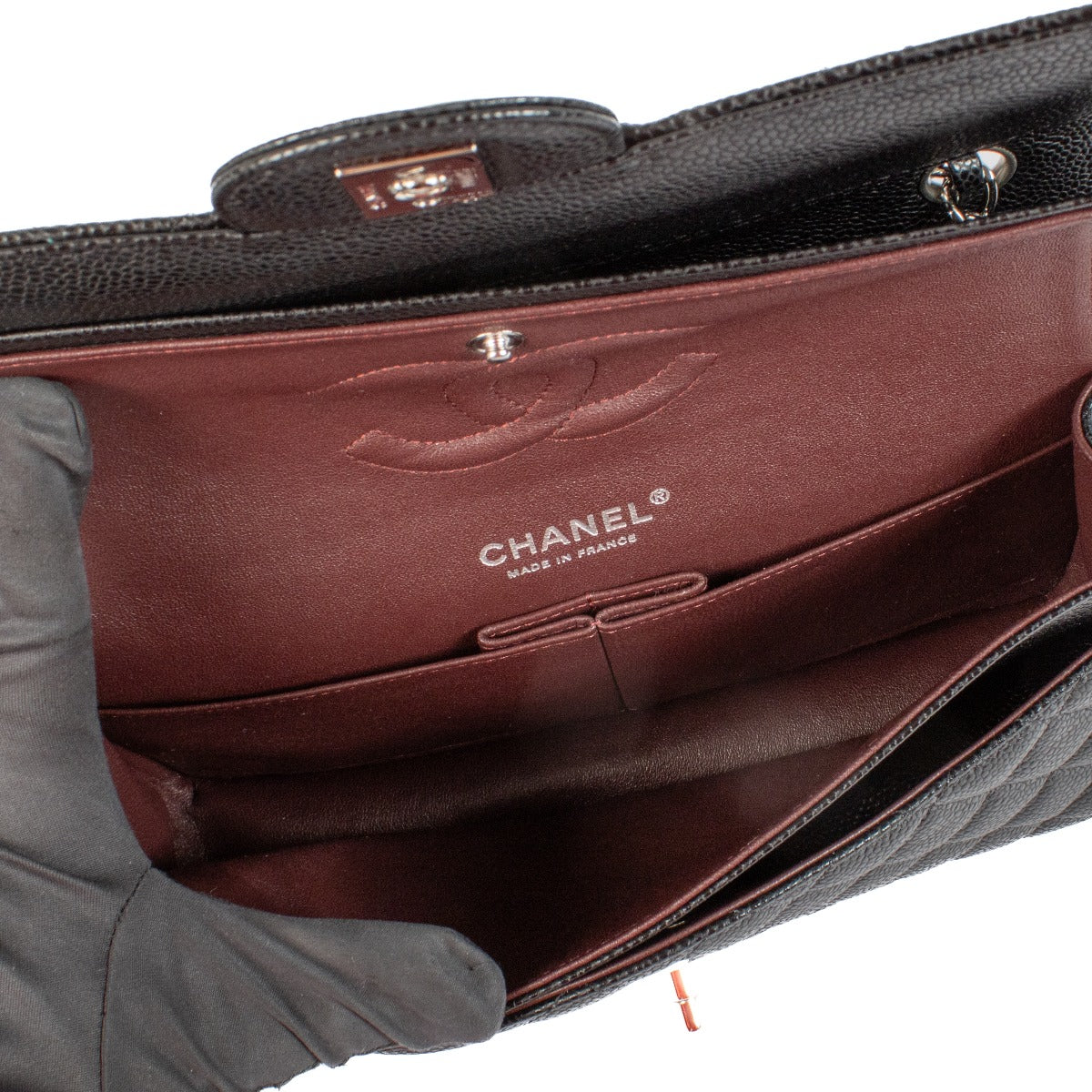 Shop safe online at Labellov in Antwerp, Brussels and Knokke this 100% authentic second hand Chanel Black Caviar Medium Classic Flap Bag