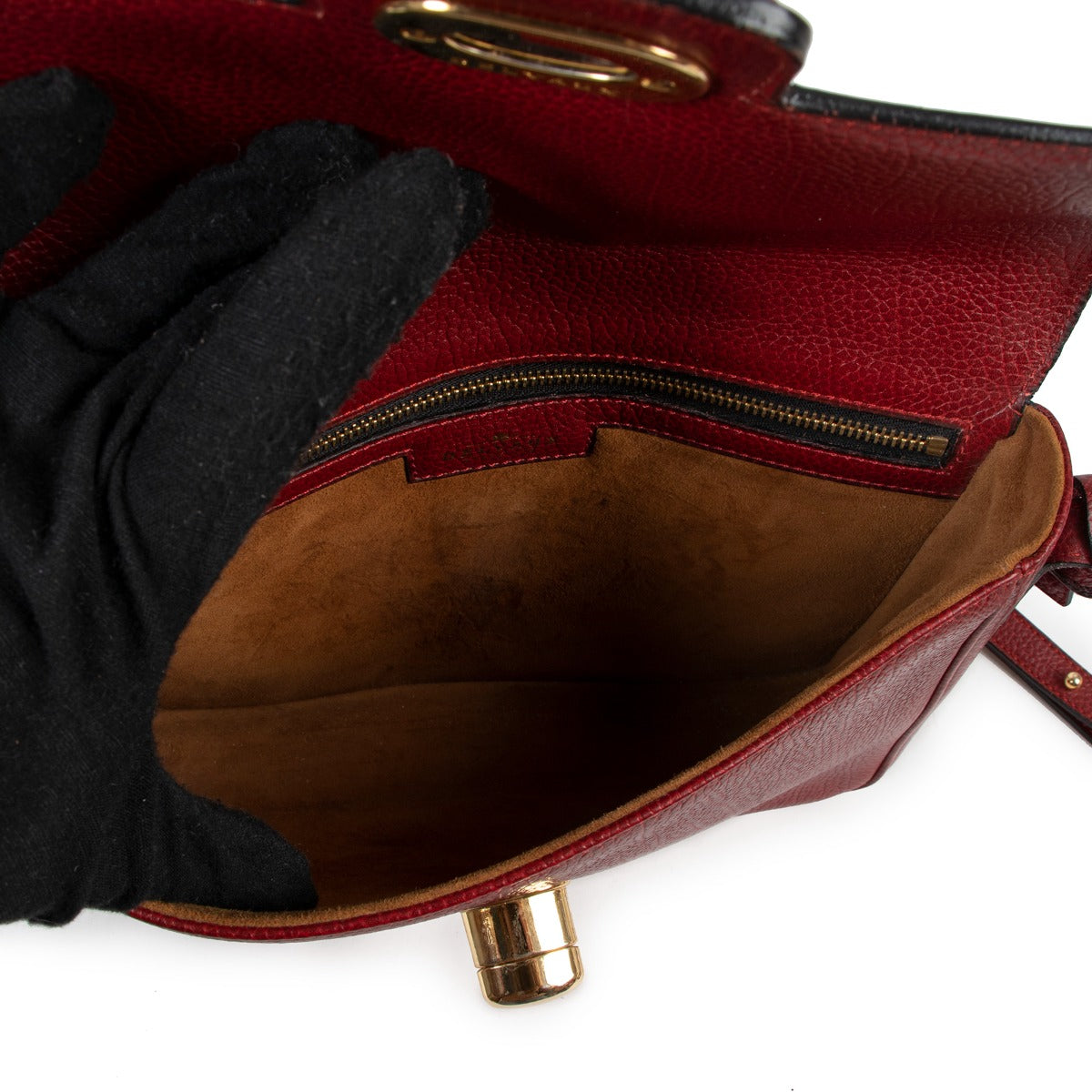Shop safe online at Labellov in Antwerp this 100% authentic second hand Delvaux Burgundy Pebbled Leather Crossbody