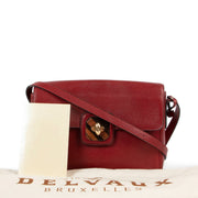Shop safe online at Labellov in Antwerp this 100% authentic second hand Delvaux Burgundy Pebbled Leather Crossbody