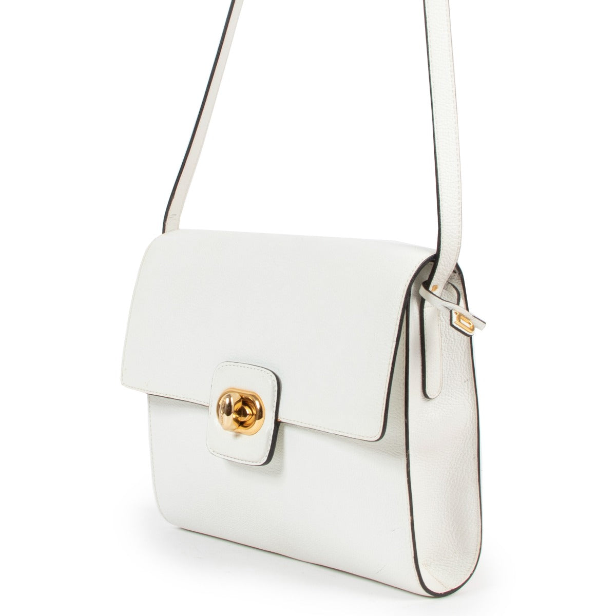 Shop vintage Delvaux White Turnlock Crossbody Bag at Labellov