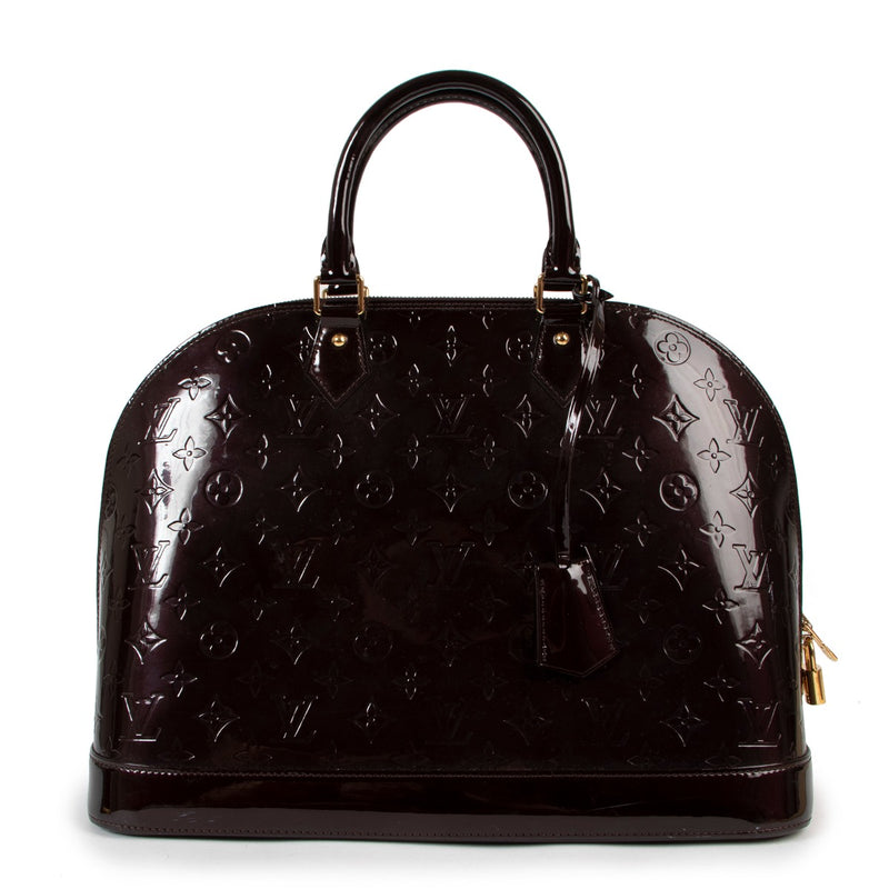 Buy online an authentic second hand Louis Vuitton Alma GM Monogram Vernis top handle in good condition at Labellov in Antwerp.