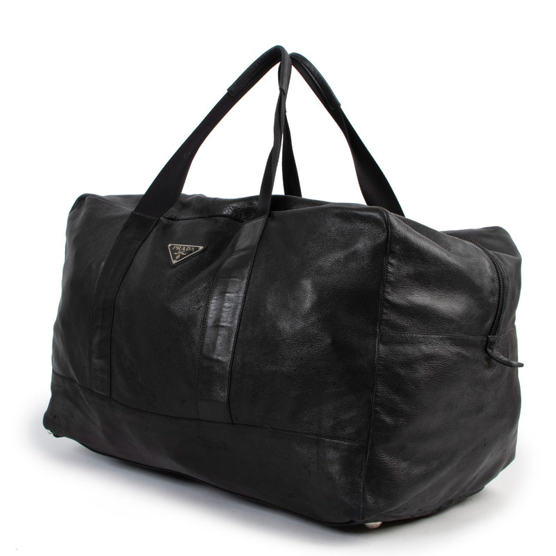Buy an authentic second hand Prada XL Black Lambskin Duffle Bag in good condition at Labellov